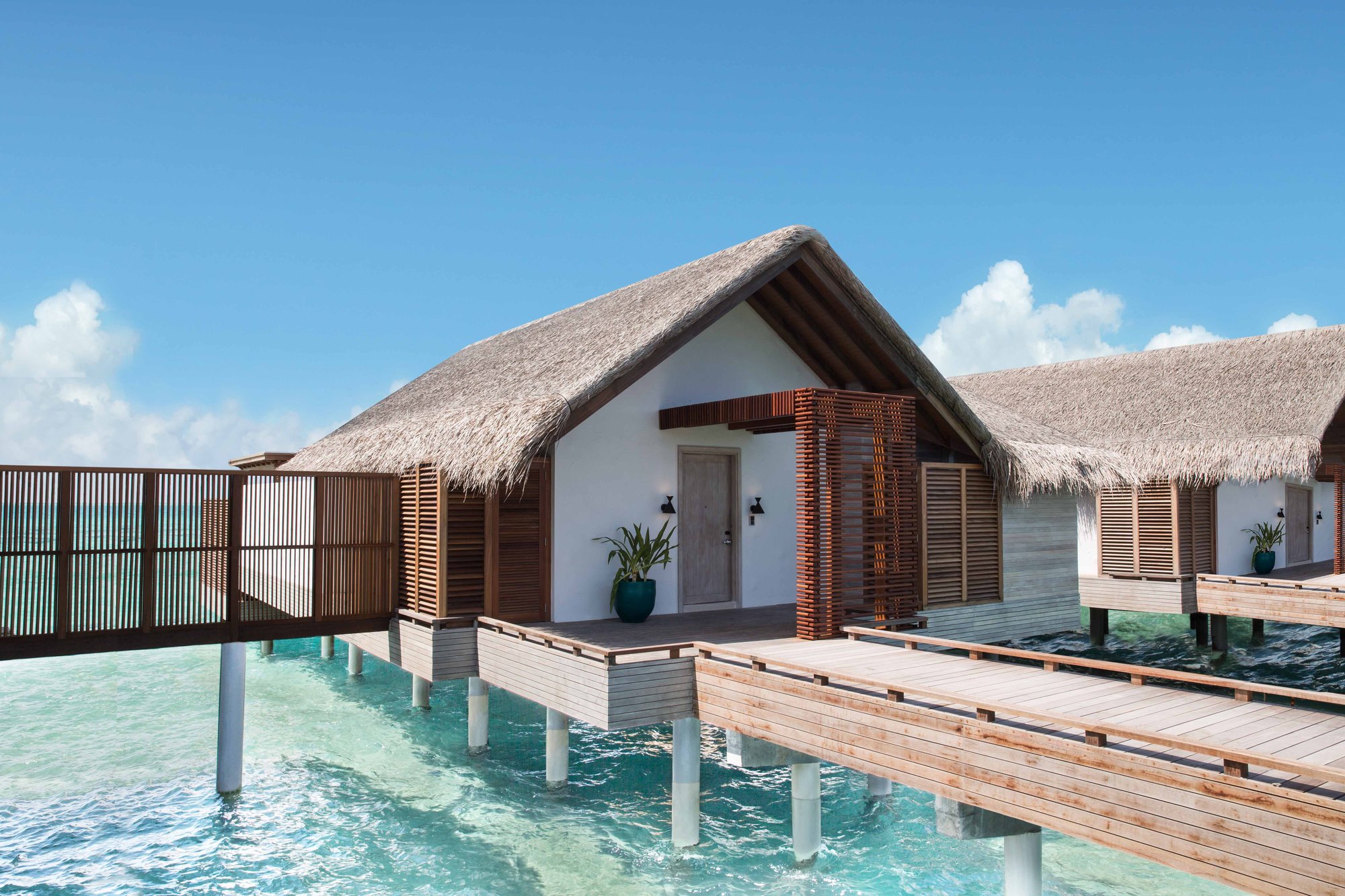 Fairmont Maldives Sirru Fen Fushi — Water villa deck over the lagoon